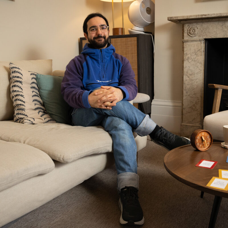 Man sat on sofa in therapy room